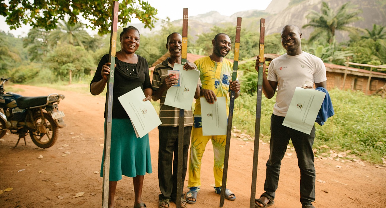 Community Health Workers with dose poles