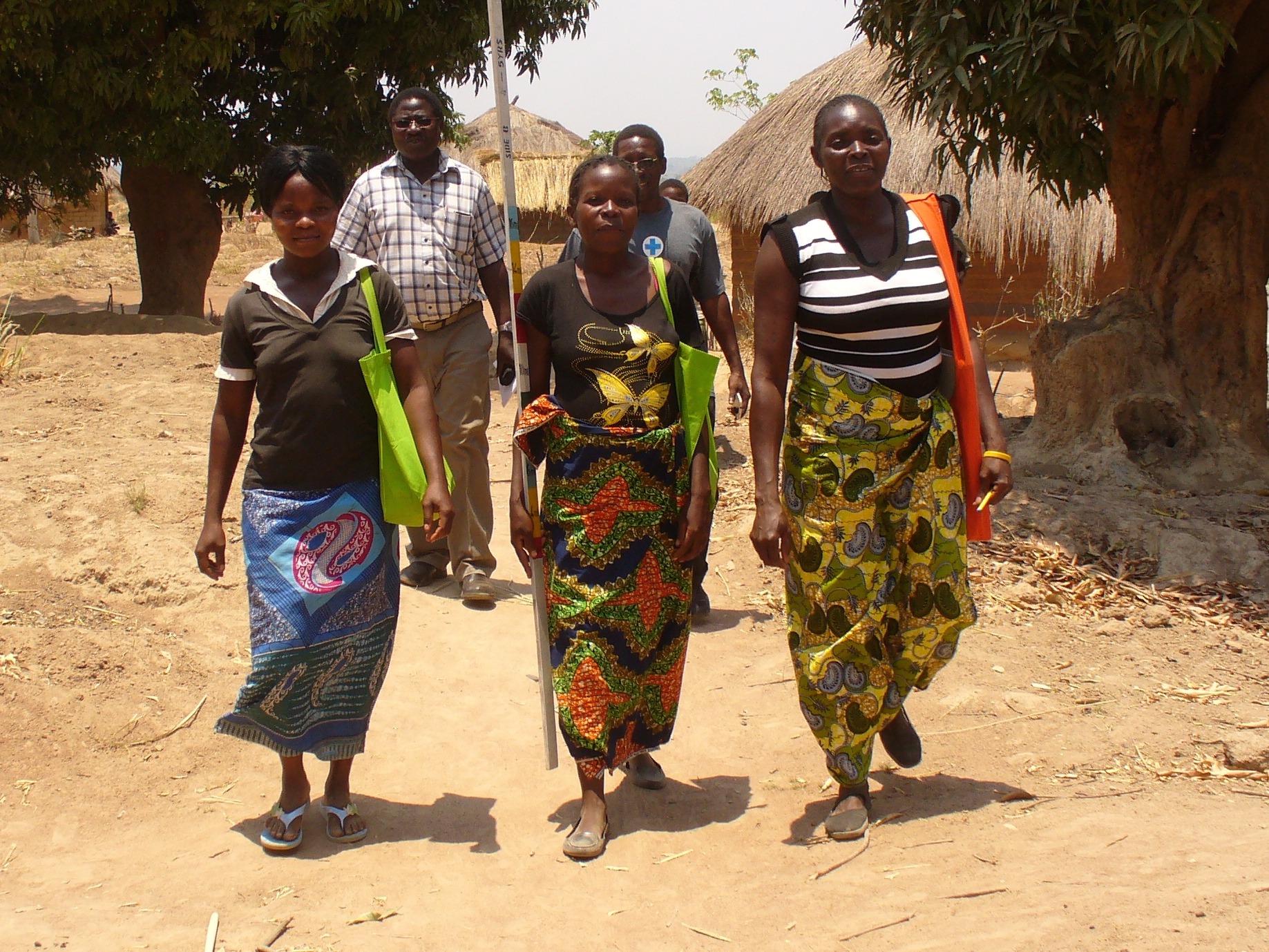 Women walking in African Village