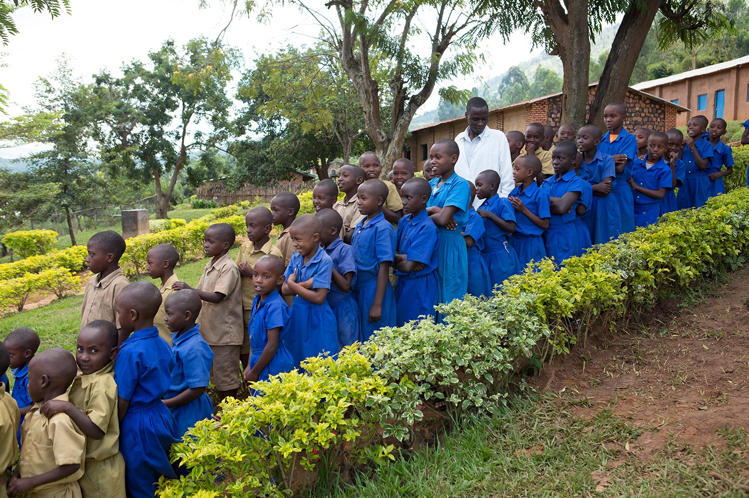 Children in line for a mass drug administration in Rwanda for neglected tropical disease treatment