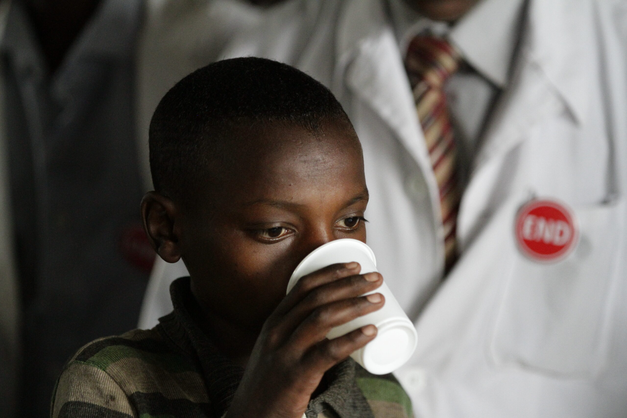 Child taking medicine