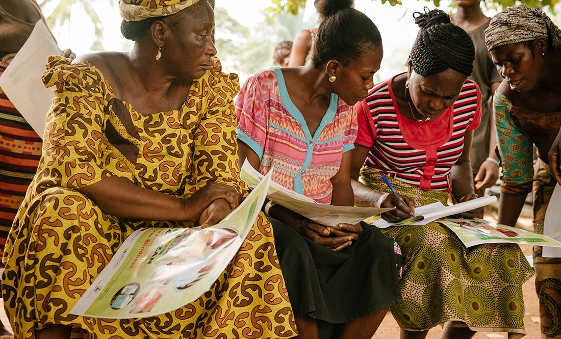 Health workers taking data.