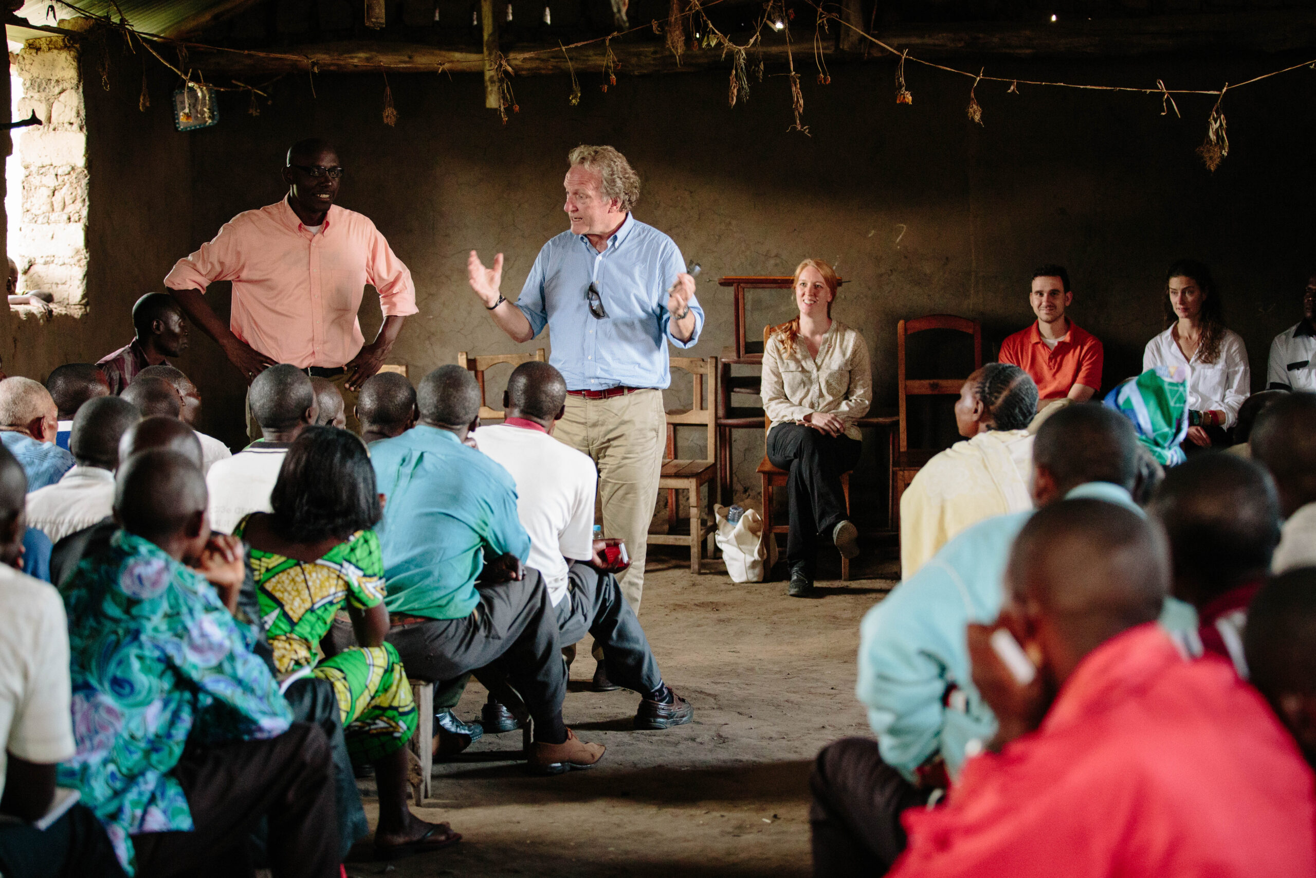 Warren Lancaster speaking to a room