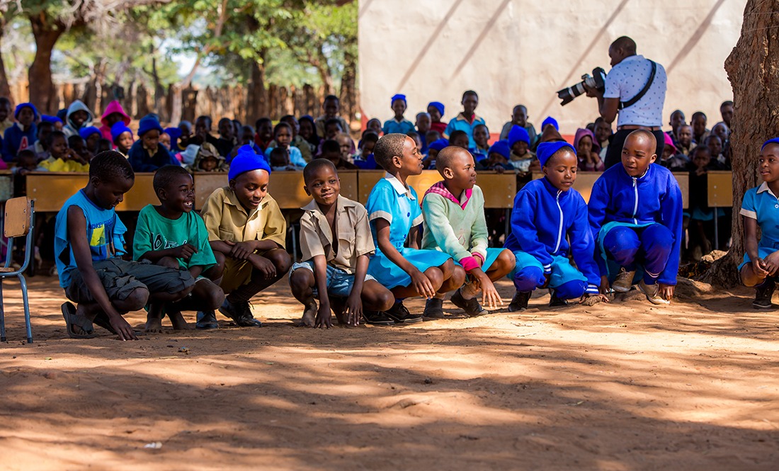Children performing a skit in Zimbabwe.