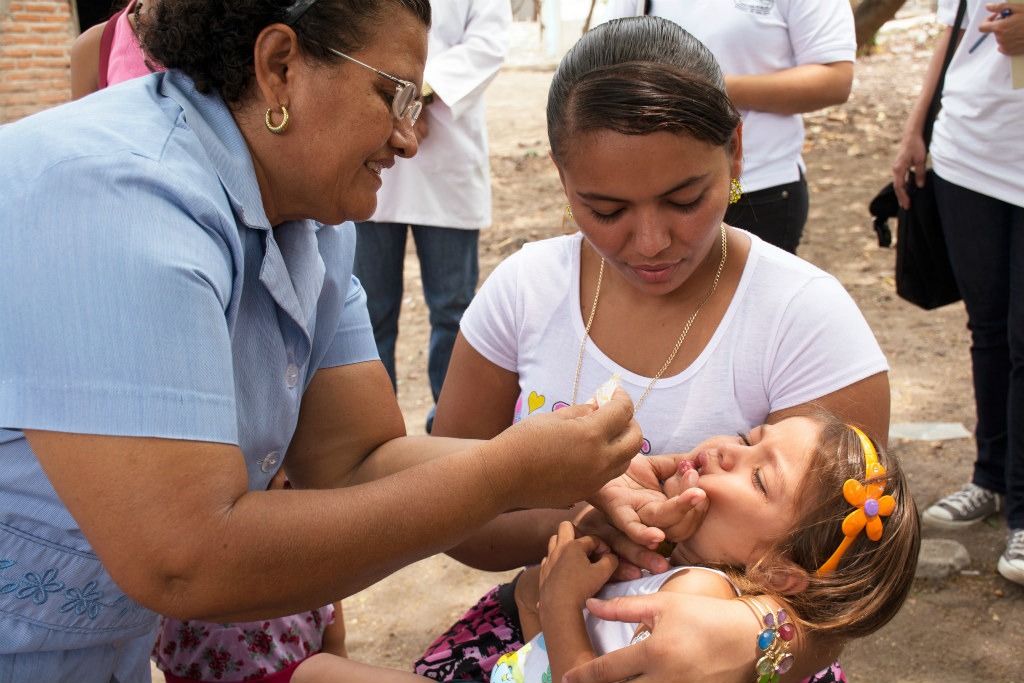 Child receiving medicine