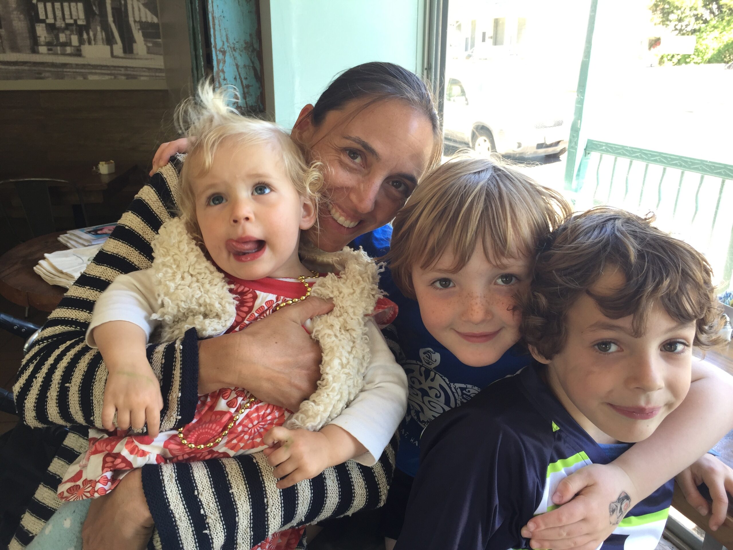 A mom and her three children.