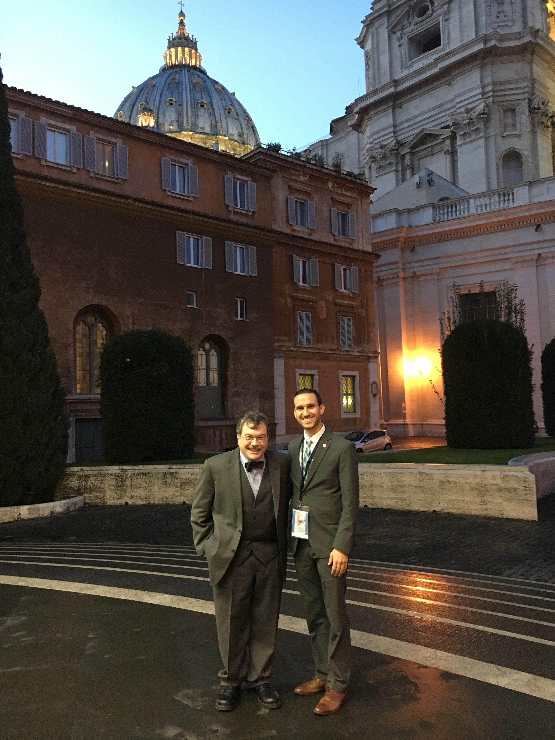 Two people pose at the Vatican.